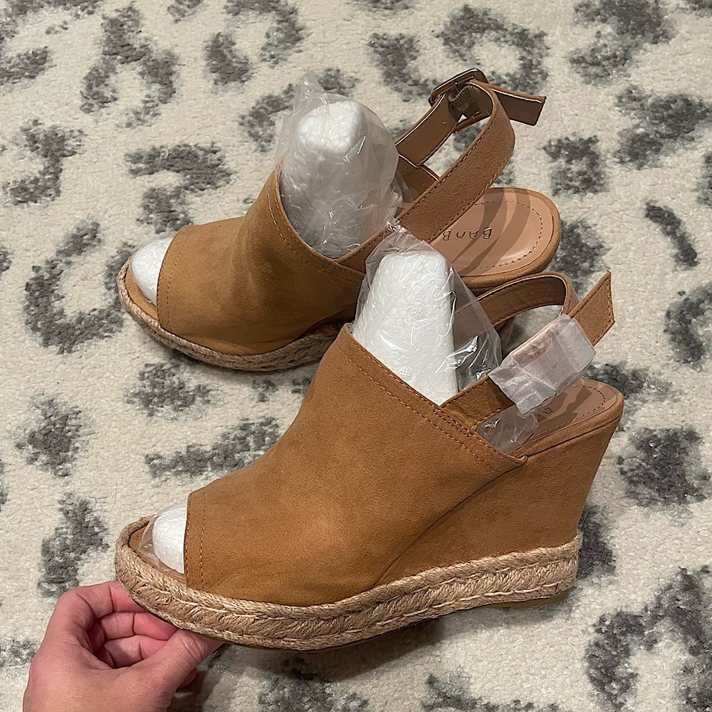 Beautiful wedges 8.5 never worn.